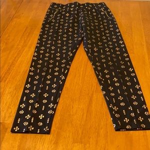Like new Cherokee size 14/16 black and gold pants